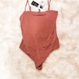 *NWT Express Bodysuit